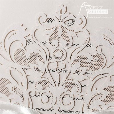 Intricate Symmetry Pocket with Ribbon laser cut wedding invitation - detail
